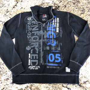 Black quarter zip pullover sweater with text print in grey, blue, and white